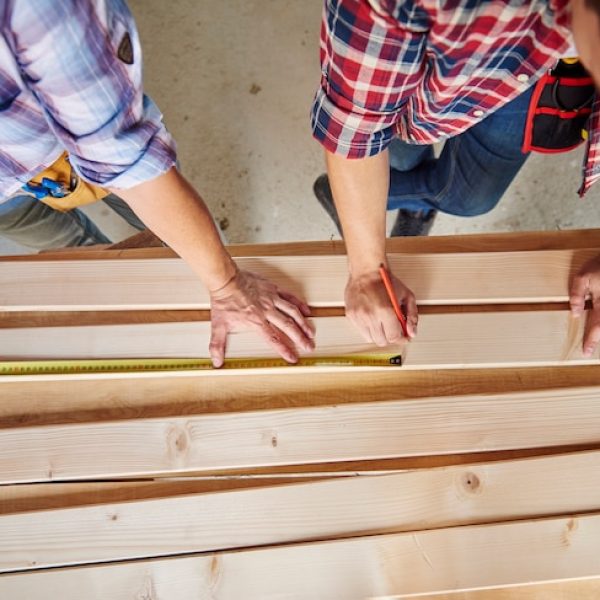 collaboration-two-carpenters-building_329181-15620